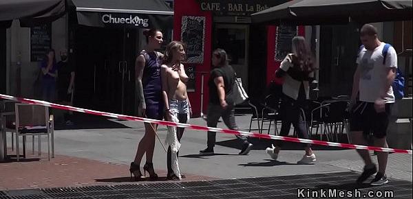  Slave caned by mistress in public